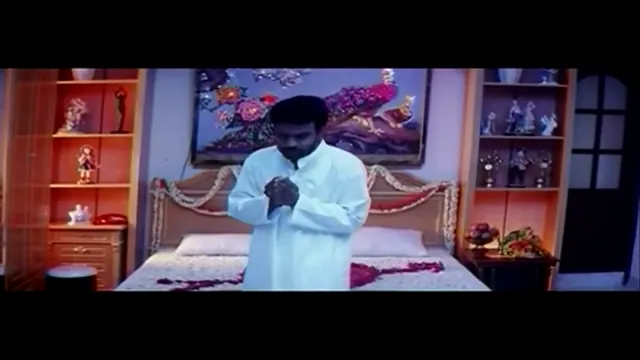 Softcore first-night moment from a Telugu film, frame 2 of 8