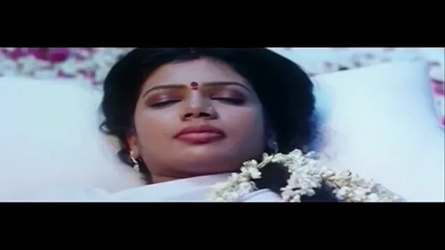 Softcore first-night moment from a Telugu film, frame 4 of 8