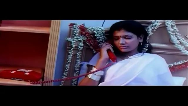 Softcore first-night moment from a Telugu film, frame 6 of 8