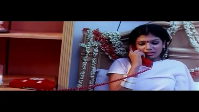 Softcore first-night moment from a Telugu film, frame 7 of 8